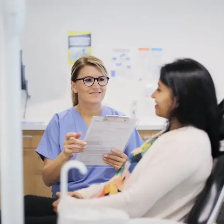patient-and-dentist-discussion.webp
